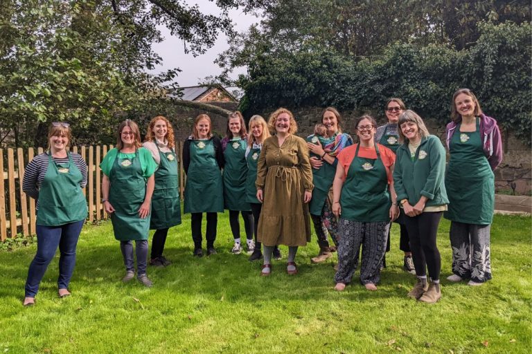 All smiles in a garden setting from the team behind Nature Makers who offer outdoor franchise opportunities
